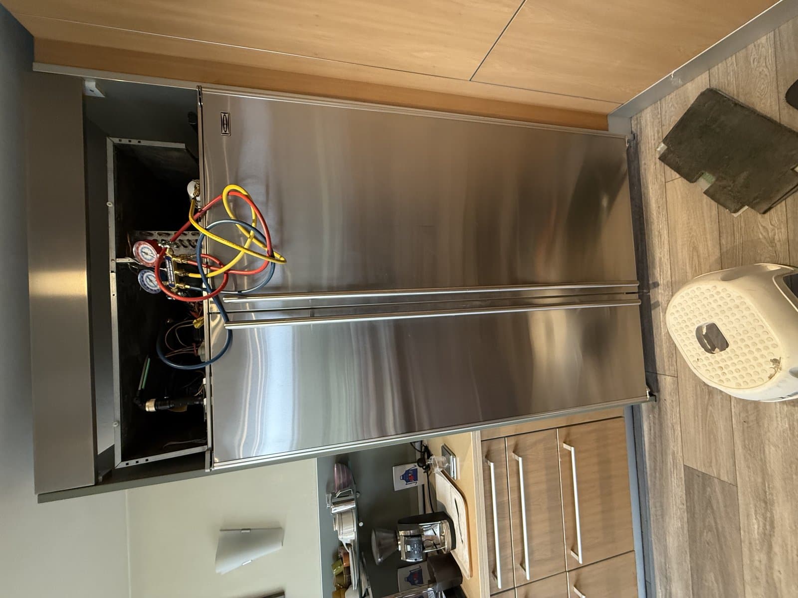 OPUS technician servicing a Miele appliance in San Diego